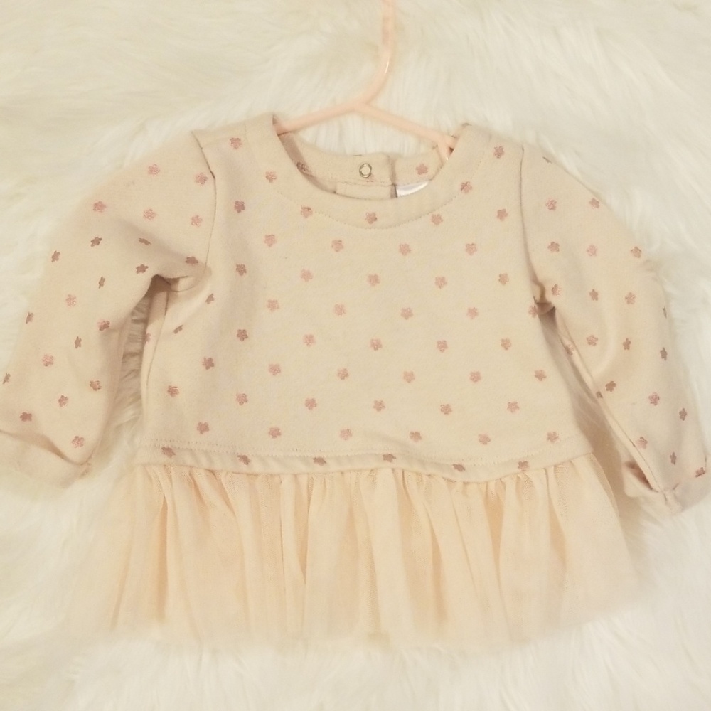 Pink sweater with attached tutu
